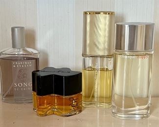 Item 108:  Crabtree & Evelyn Song de Chine Perfume (far left):  $75                                                                                               Item 109:  Oscar de la Renta Perfume (2nd from left): $25                                                                                                            Item 110:  White Linen by Estee Lauder (3rd from left): $45                                                                                                             Item 111:  Clinique Happy (right):  $35
