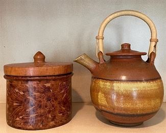 Item 32:  Pier 1 Covered Pottery Canister (left) - 5.5":  $28                                                                                                             Item 33:  Crystal Pottery Tea Pot with Bamboo Handle - 6.5":  $42
