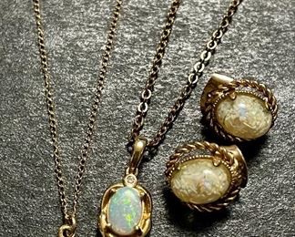 Item 242:  Opal Necklace with 14K chain (left): $65                                                                                 Item 243:  18K Opal Pendant - chain is not gold  (center):  $65                                                                                                            Item 244:  Opal Earrings (right): $45