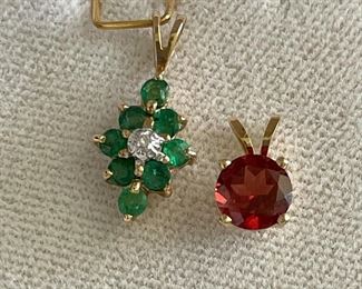 Item 259:  14 K Small Emerald and Diamond Pendant: $45                                                                                                            
Item 260:  Small Garnet Pendant: $25
