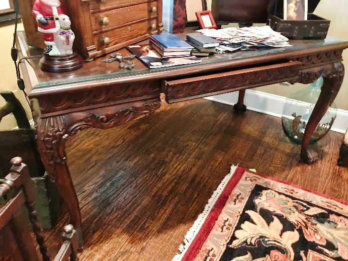 Ornate Hand Carved desk with lap drawer, Lions feet (32wx62lx30h)