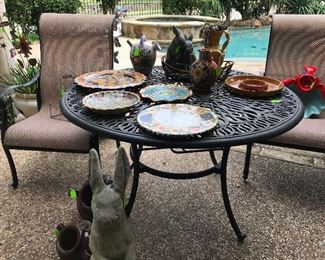 Patio set, large Tuscany colorful platters, concrete Bunny