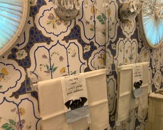 Crystal sconce and antique linens