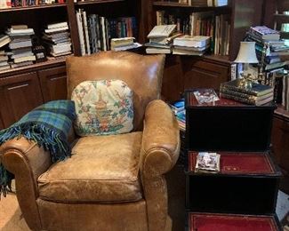 In the study we will find a Ralph Lauren leather chair with a black Chinese chinoiserie step table. Books! Books! And More Books!!