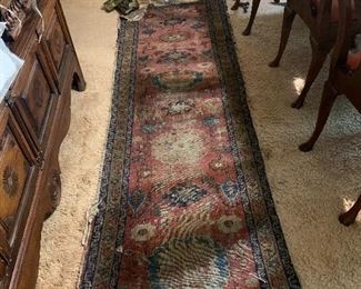In the dining room we have an old Persian runner.