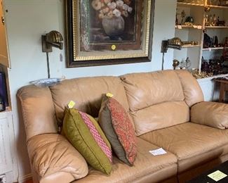 A leather recliner sofa