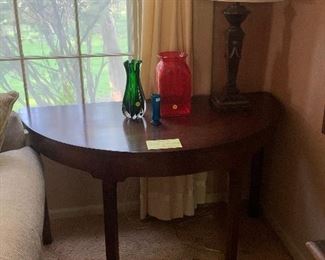 One of a pair of Demilune tables