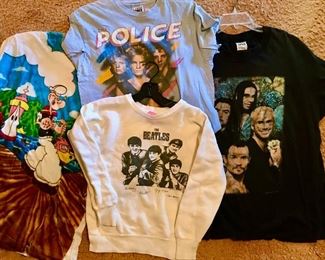 Plenty of vintage collectible t-shirts including, cartoon characters, novelty, advertising, concert and music themes. Stand outs include a rare vintage 1963 child size Beatles concert sweatshirt.