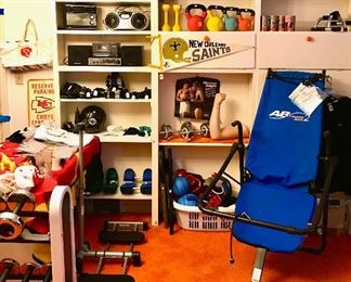 In the Exercise Room you will also find portable sound equipment, New Orleans Saints signed pennant, and MORE weights!
