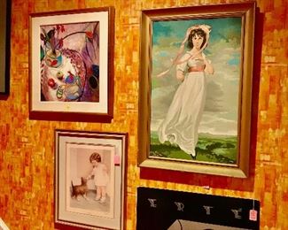 Lot's of art to choose from in the orange hallway.