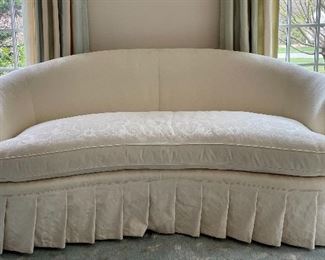 Item 36:  TRS Furniture Ivory, Damask Curved Sofa with Pleated Apron- pristine condition - BDC- 75"l x 25"w x 32"h: $1165