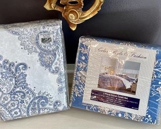 Item 60:  Whit & Alex King Duvet Set (left):  $38                                                   Item 61:  3 Piece King Duvet Cover Set (right): $38  
