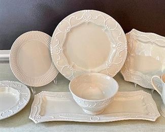 Item 73:  Aristocrat Dinnerware Ambiance Collection: $345                                                                                                              12 dinner plates, 12 square plates, 6 soup bowls, 12 bowls, 8 mugs, 7 salad plates, 2 serving trays