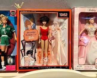 Item 245:  NBA Celtics Barbie (left): $20                                                                                               Item 246:  1962 Barbie (middle):  $58                                                                                Item 247:  Birthday Wishes Barbie (right): $22