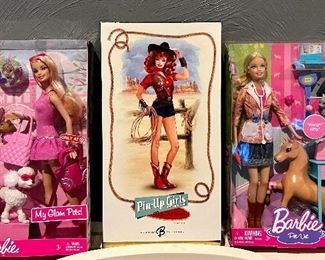 Item 251:  My Glam Pets! Barbie - Exclusive to Target (left):  $70                                                                                                             Item 252:   Pin-Up Girls Barbie Gold Label (middle):   $125                                                                                                                       Item 253:  Barbie Pet Vet (right): $55