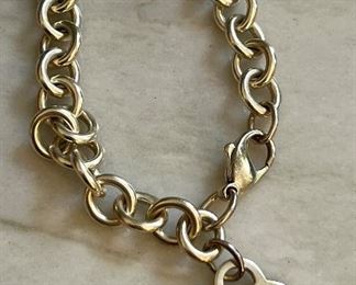 Item 266:  Tiffany Signature Bracelet with Heart Charm: $150