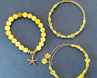 Item 301:  2 Alex and Ani and One Stone Bead Bracelet with Starfish: $22