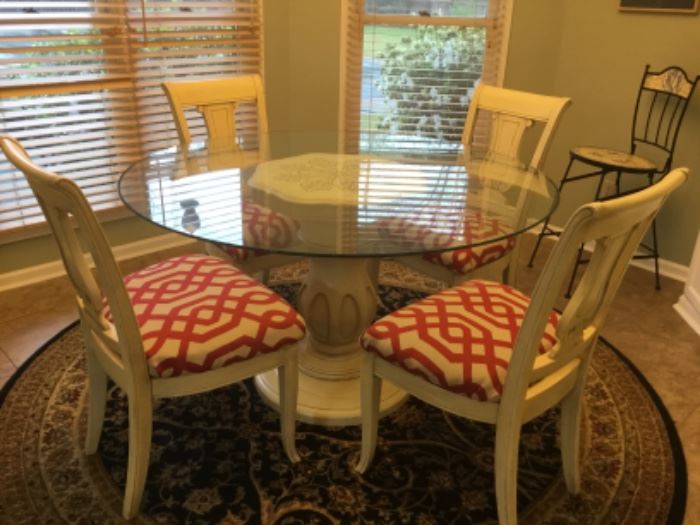 Lovely round glass pedestal table & four chairs - rug also for sale 