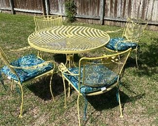 Yellow wrought iron table w/4 chairs