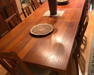 Wow. One of our best MCM dining room table and chairs