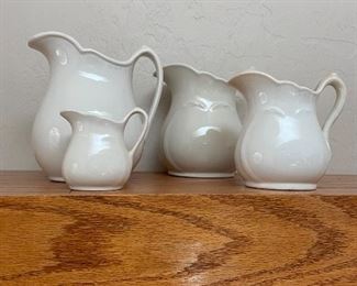 Collection of antique stoneware pitchers