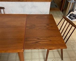 Hidden leaf on Mid Century table