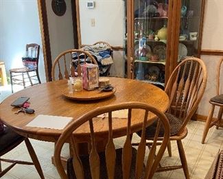 Kitchen table and chairs. Table has leaf.