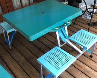 Folding picnic table and benches. 
Folds into a carrying case