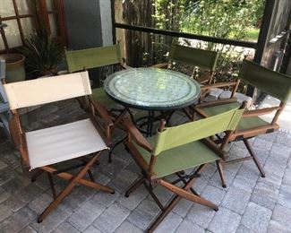 Folding director chairs by Telescope Folding Chairs Co. 
Tile top table 