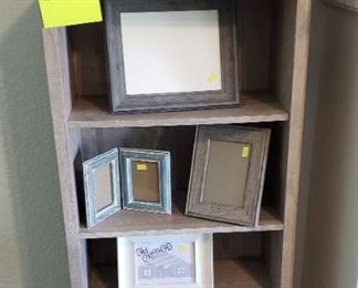 Shelves, picture frames, elephant figurines
