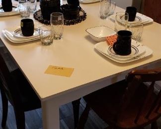 4 legged white table, black/white correle, black tiara diamond