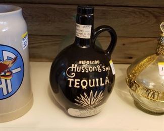 collectible liquor bottles and 1 USAF stein