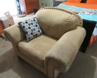 Over sized chair and ottoman in Master Bedroom.