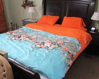 King size bed (complete) with head and foot board, sleep number mattress. Lamps, bedside tables. Linens.