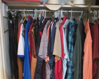 Some of the men's shirts and clothing - New Stetson hat and few other cowboy hats. Located in master bedroon.