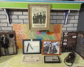 Numerous Wyatt Earp and Doc Holiday items to include scarce action figures. Authentic straight razor with COA that came from the movie.