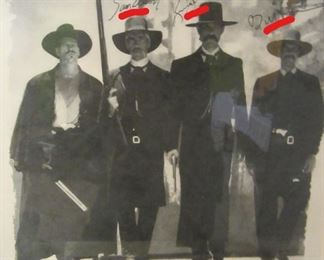 Looks to be autographed (see red marks above) by all the stars of the movie Tombstone.