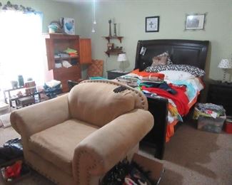 Master bedroom, bed with sleep number mattress. Bedside tables, lamps, linen, clothing, Pine wardrobe and lots more.