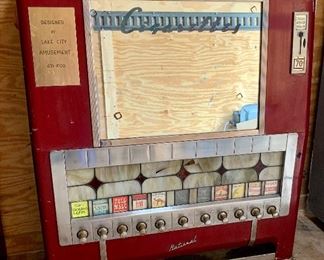 Vintage Art Deco National 70 cent Bar/Pool Hall Cigarette Vending Machine, damage to the decorative glass panels, fine mirror with Deco lettering 
