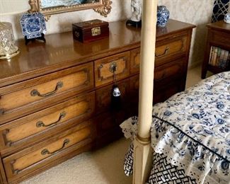 Mid Century era 9 drawer dresser, a pair of bedside cabinets with built in electrical sockets 