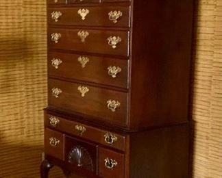 Superb mahogany Mid Century Councill highboy with fan detailing, brass pulls and carved finials, 82” tall 