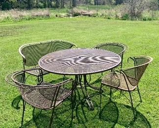 Vintage Mid Century Era metal patio table, bench and chairs 