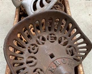 More antique Cast iron farm Tractor Seats, cast iron architectural pieces and 1930s era child’s pull wagon  