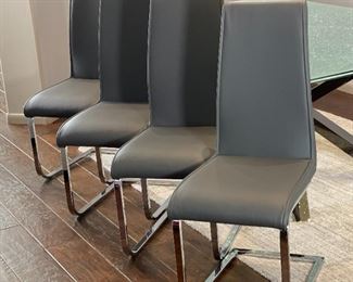 4pc Contemporary Faux Leather & Chrome Side Chairs 41 x 17 x 21in seat height 18.75in HxWxD