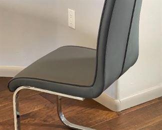 4pc Contemporary Faux Leather & Chrome Side Chairs 41 x 17 x 21in seat height 18.75in HxWxD