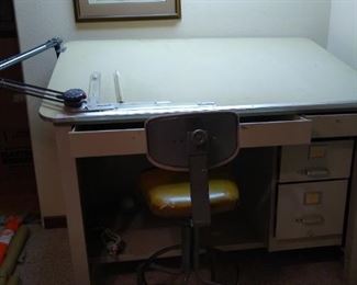 drafting table with arm, chair and light