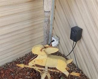 Bunny rabbit weather vane and cute primitive birdhouse.