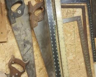 Saws, squares, and rulers.