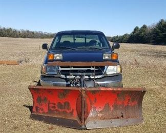 2003 Ford F150 4x4 Truck with V Boss plow, and Snow Ex Spreader , also has a stainless steal Delta Champion Tool Box, new battery. One owner. Mileage&nbsp;92140.6