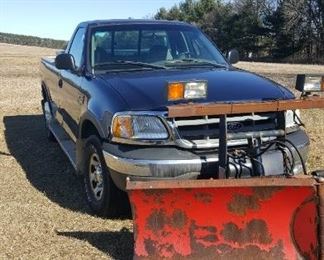 2003 Ford F150 4x4 Truck with V Boss plow, and Snow Ex Spreader , also has a stainless steal Delta Champion Tool Box, new battery. One owner. Mileage&nbsp;92140.6